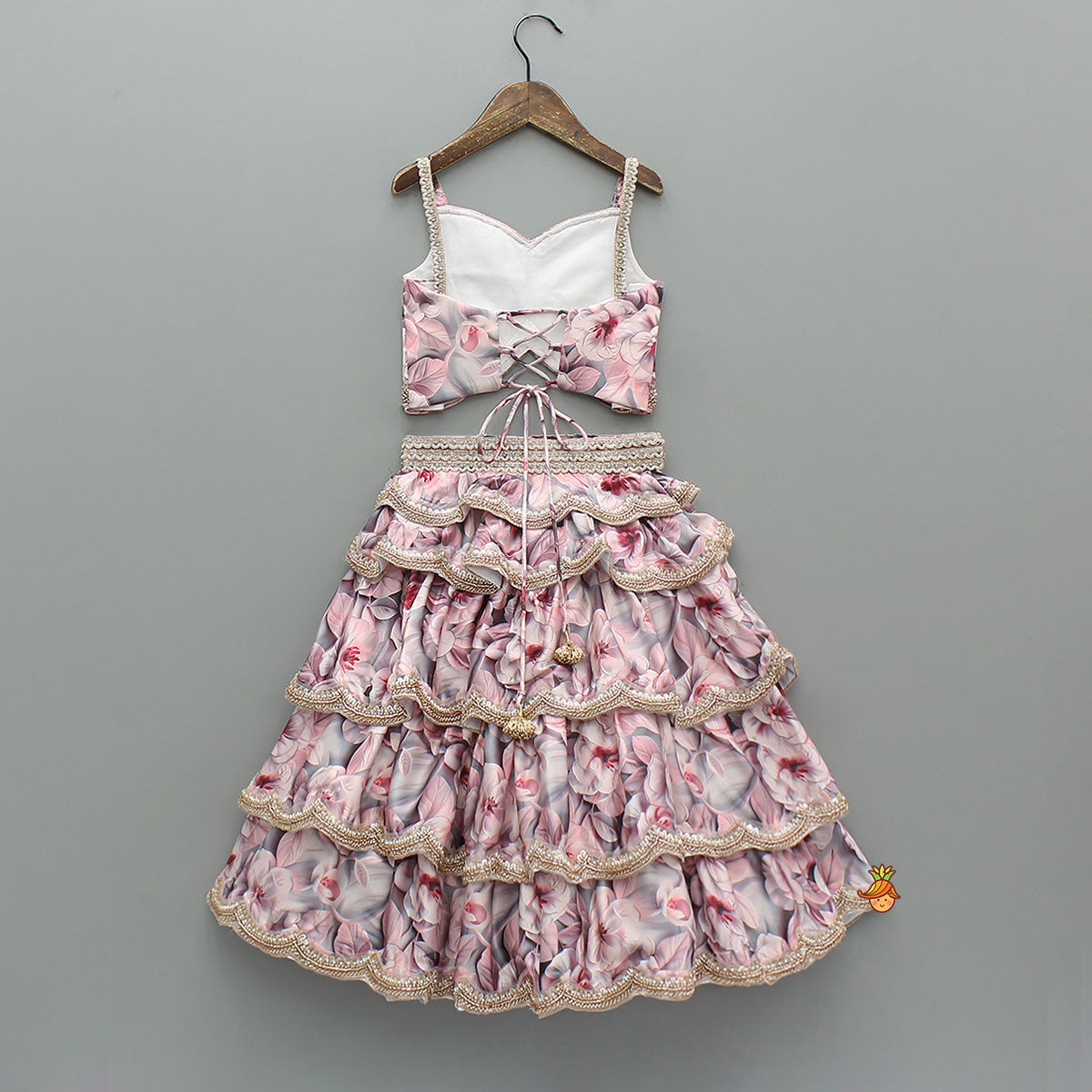 Printed Strappy Top And Graceful Layered Lehenga