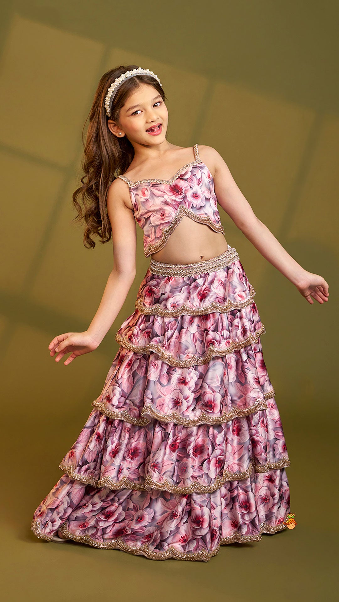 Printed Strappy Top And Graceful Layered Lehenga