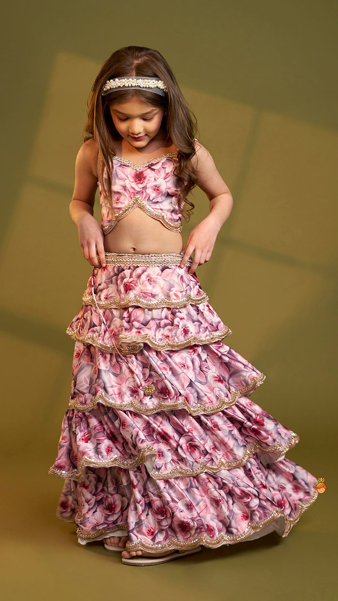 Printed Strappy Top And Graceful Layered Lehenga