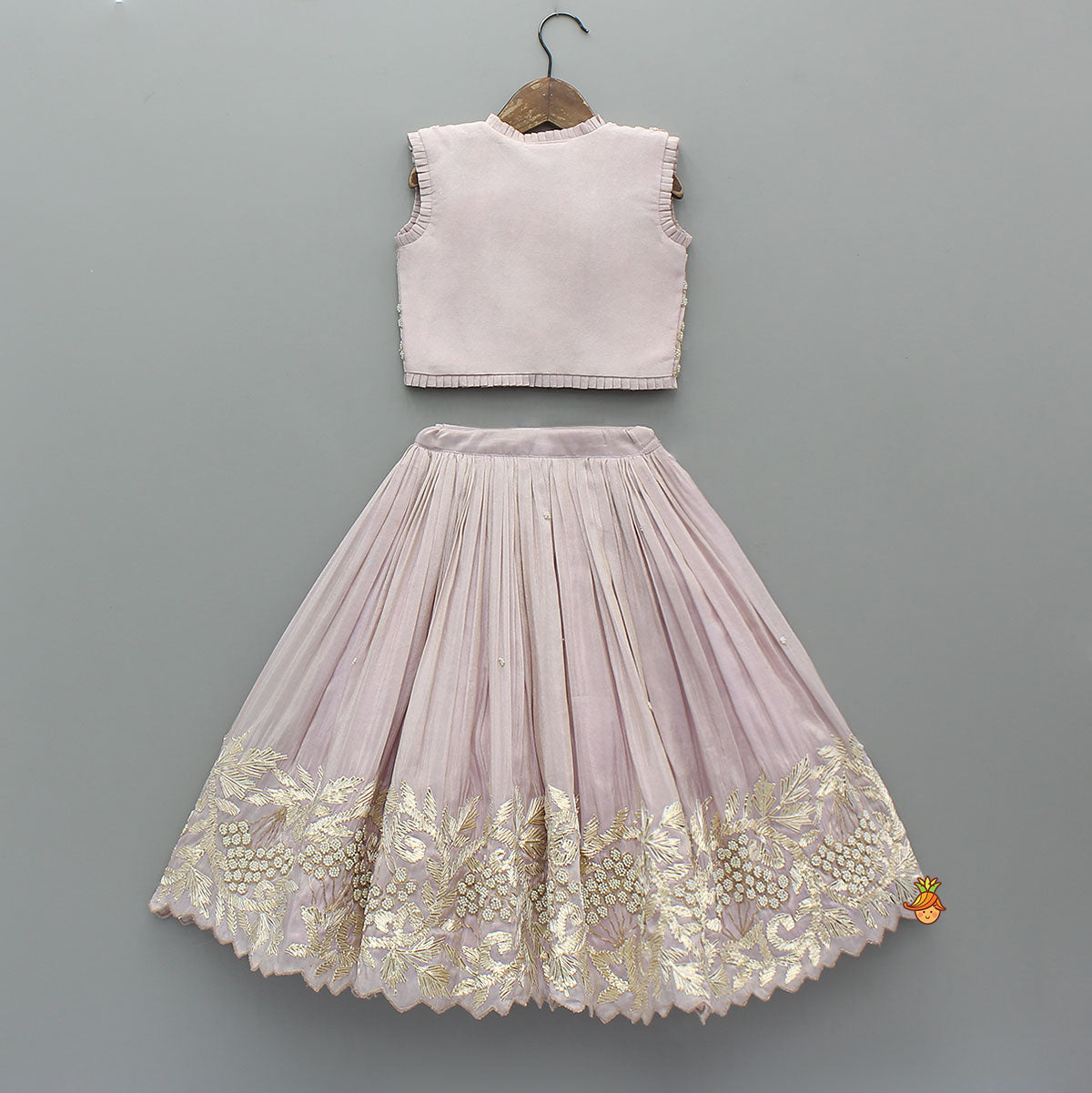 Embroidered Stylish Hem Shimmery Top And Pleated Lehenga With Net Dupatta