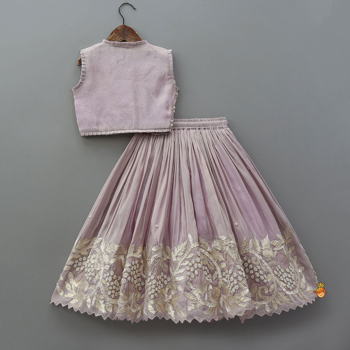 Embroidered Stylish Hem Shimmery Top And Pleated Lehenga With Net Dupatta