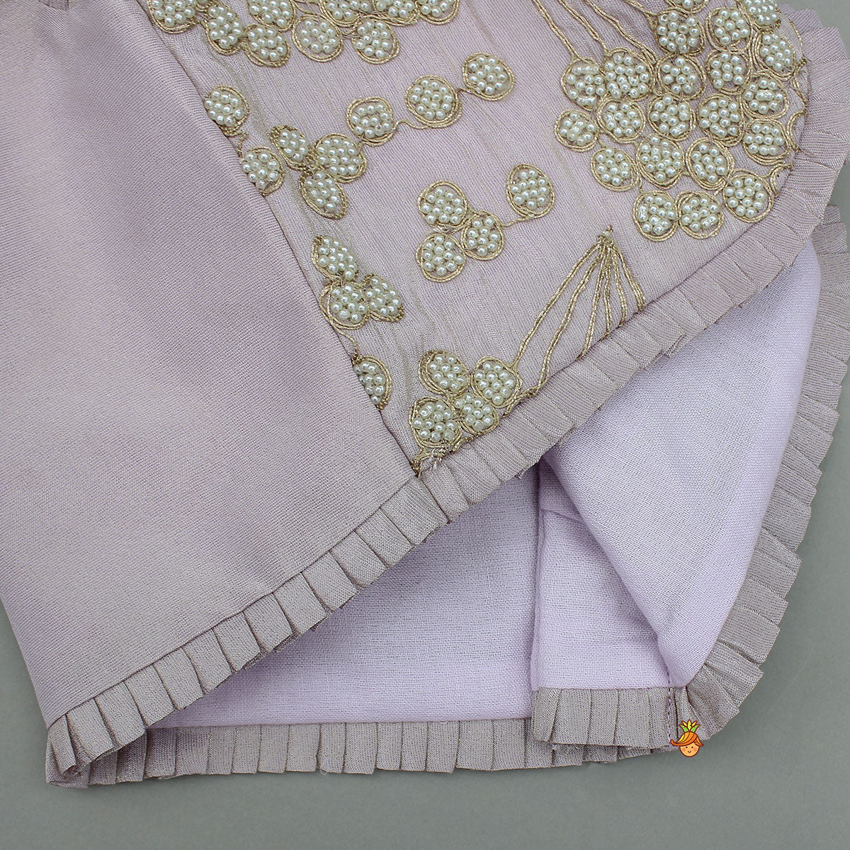 Embroidered Stylish Hem Shimmery Top And Pleated Lehenga With Net Dupatta