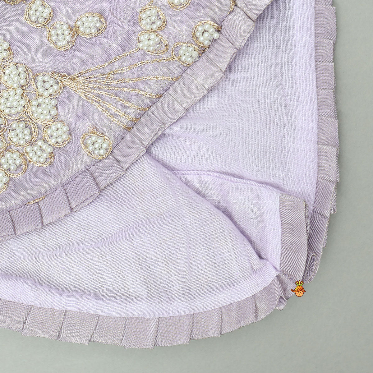 Embroidered Stylish Hem Shimmery Top And Pleated Lehenga With Net Dupatta