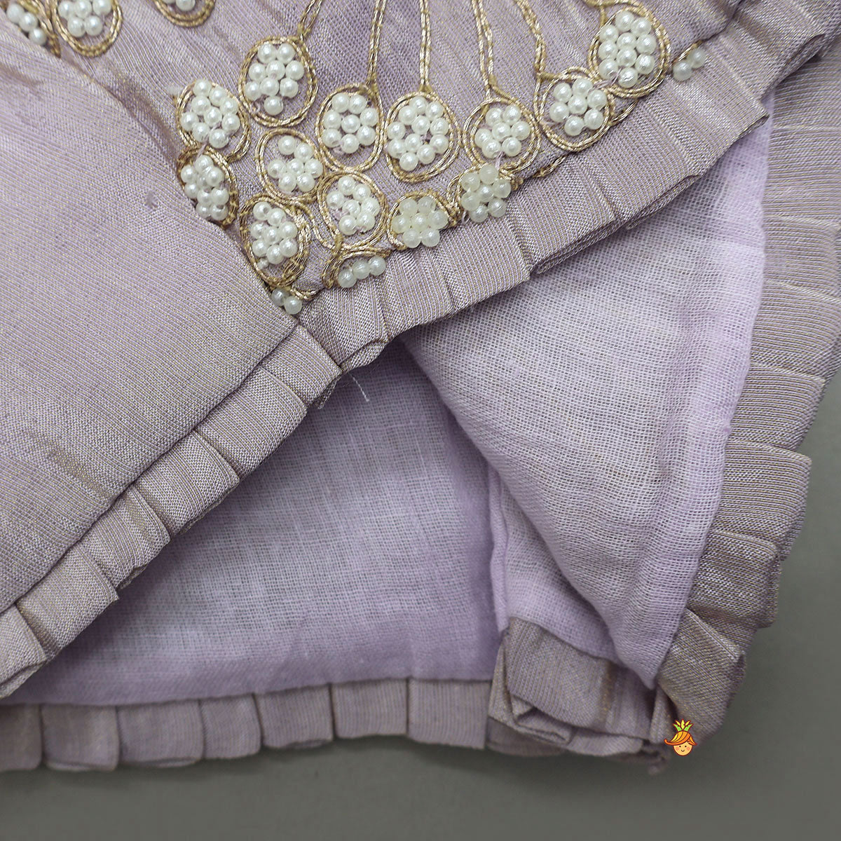 Embroidered Stylish Hem Shimmery Top And Pleated Lehenga With Net Dupatta