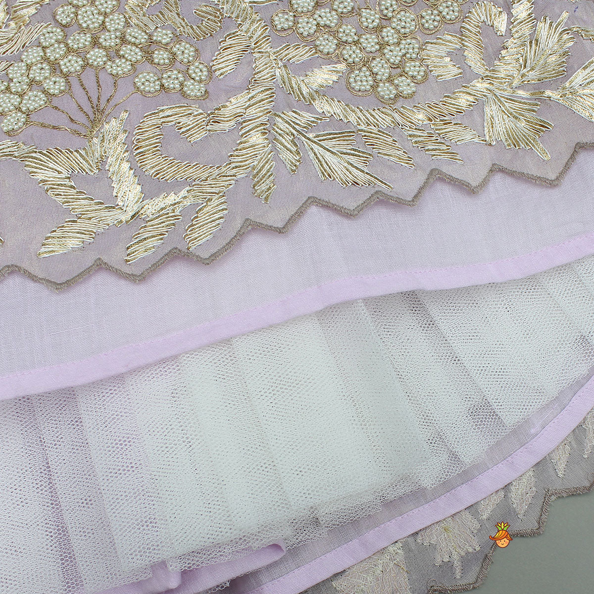 Embroidered Stylish Hem Shimmery Top And Pleated Lehenga With Net Dupatta