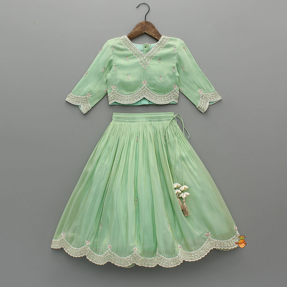 Stylish Hem Embroidered Top And Scalloped Lehenga