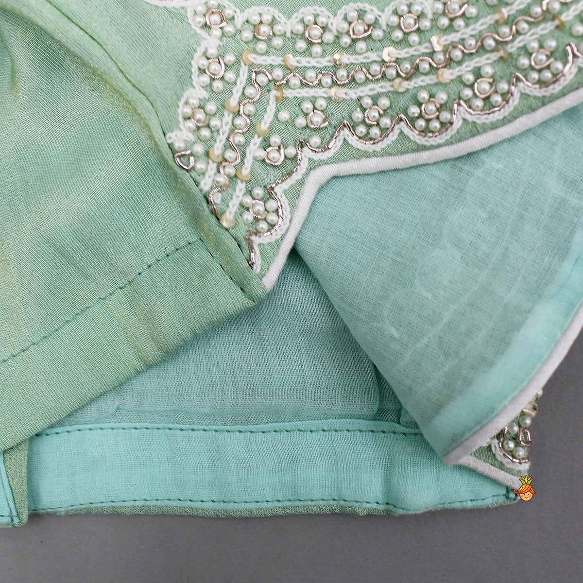 Stylish Hem Embroidered Top And Scalloped Lehenga