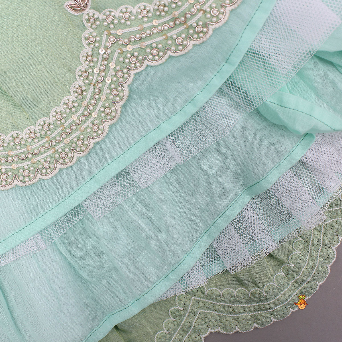 Stylish Hem Embroidered Top And Scalloped Lehenga