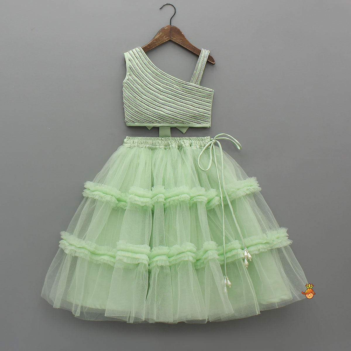 Shiny Lace Work One Shoulder Top And Ruffle Lehenga