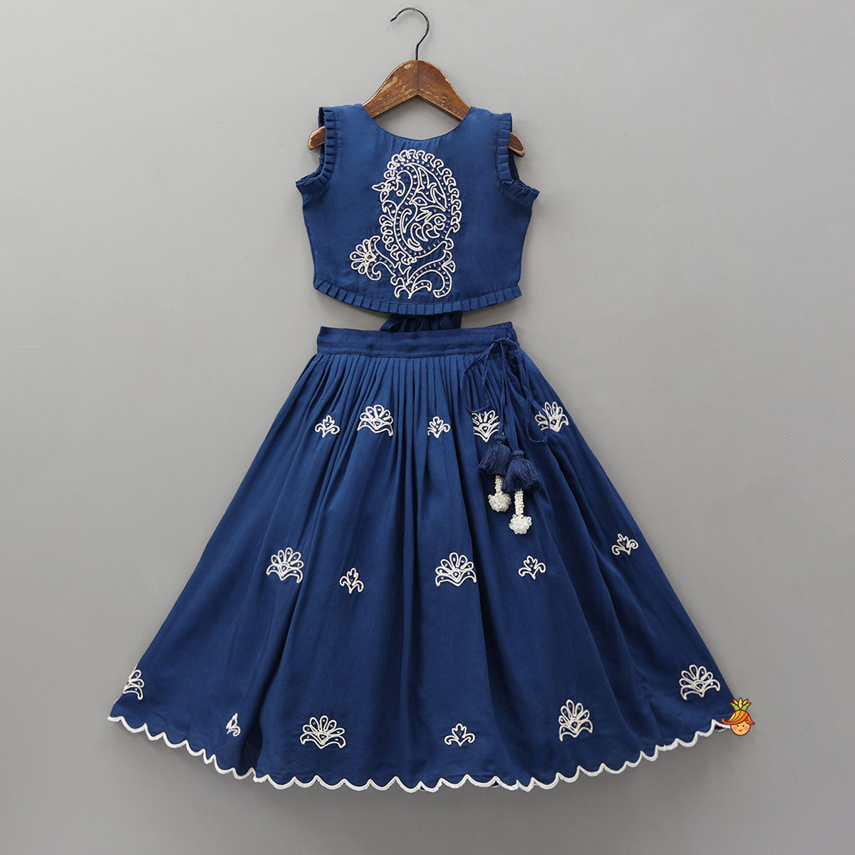 Dual Back Knot Detail Top And Tassels Enhanced Lehenga