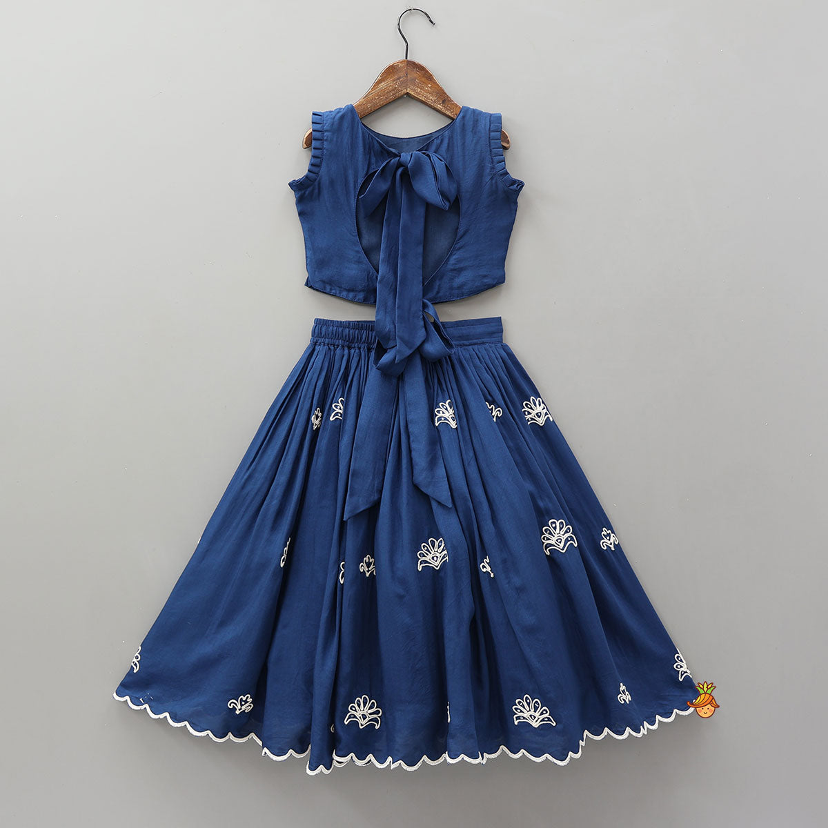 Dual Back Knot Detail Top And Tassels Enhanced Lehenga