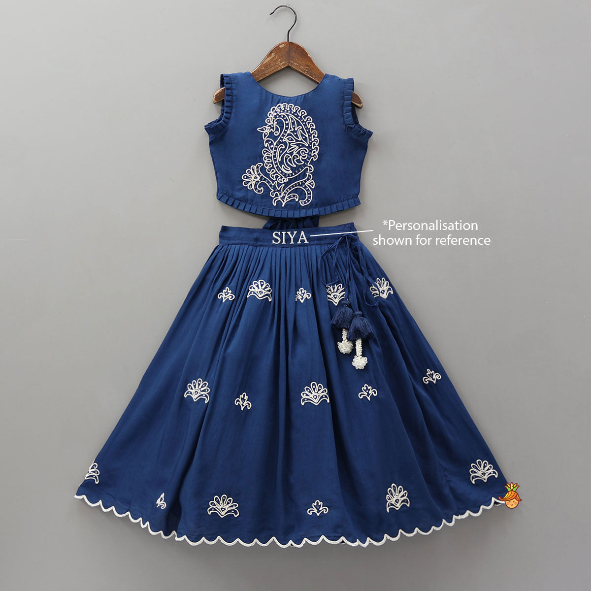 Dual Back Knot Detail Top And Tassels Enhanced Lehenga