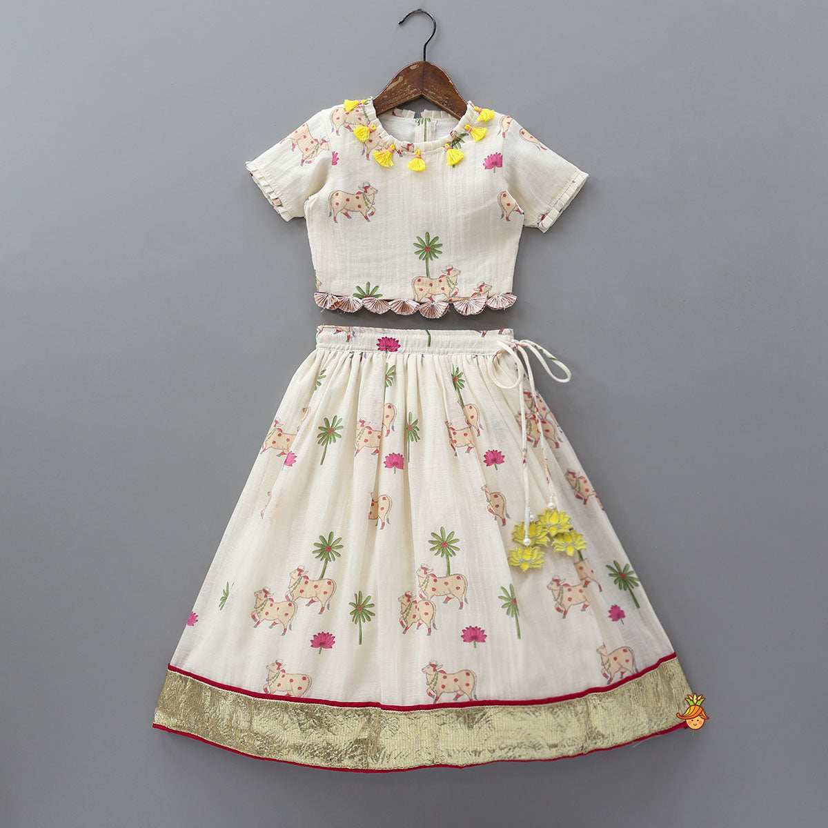 Adorable Printed Top With Fringed Detailing And Lehenga