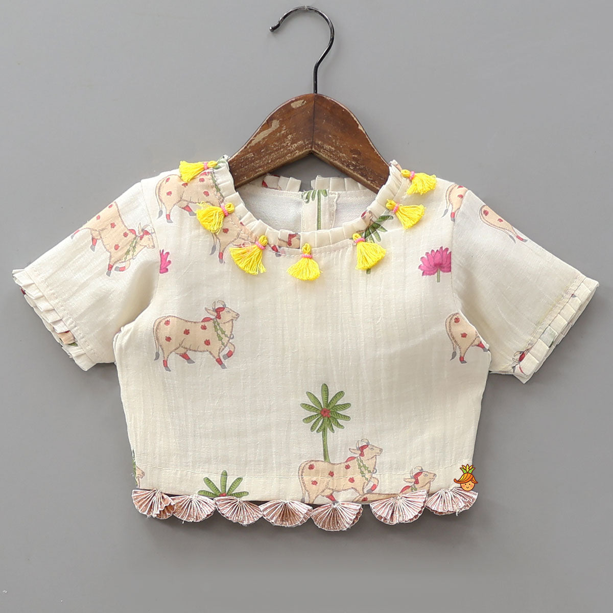 Adorable Printed Top With Fringed Detailing And Lehenga