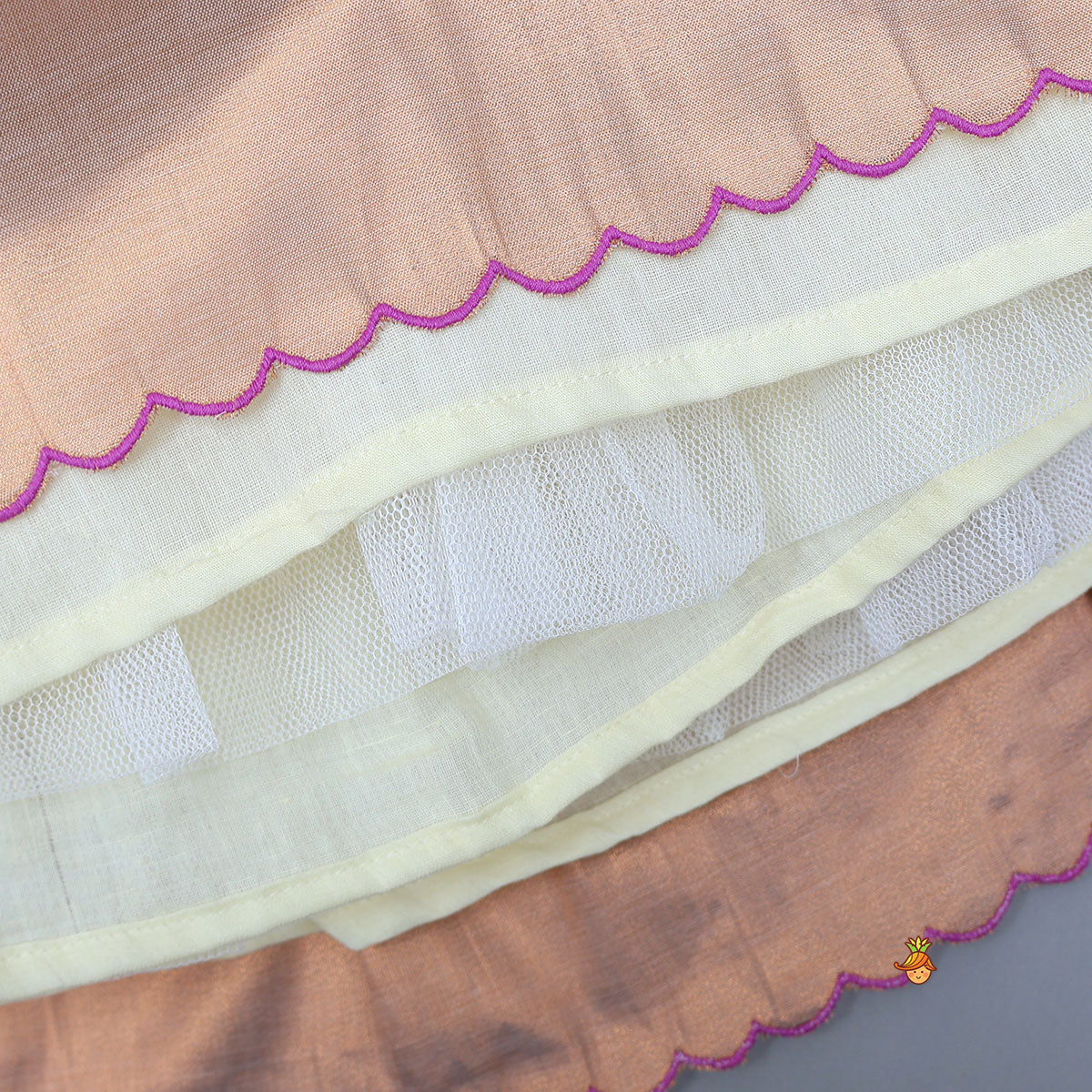 Scalloped Hem Shimmery Top And Panel Lehenga