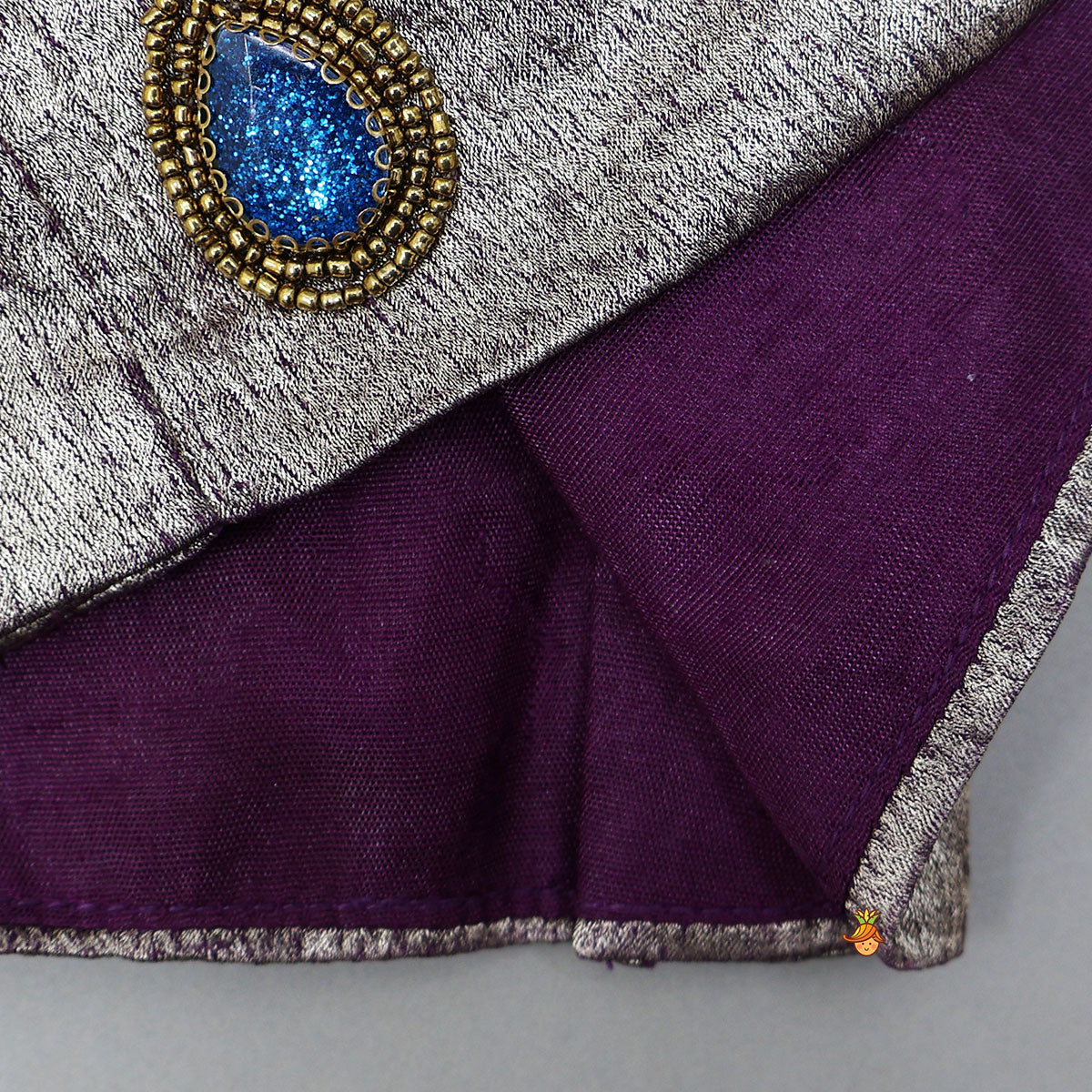 Sleeveless Shiny Top With Layered Lehenga And Attached Dupatta