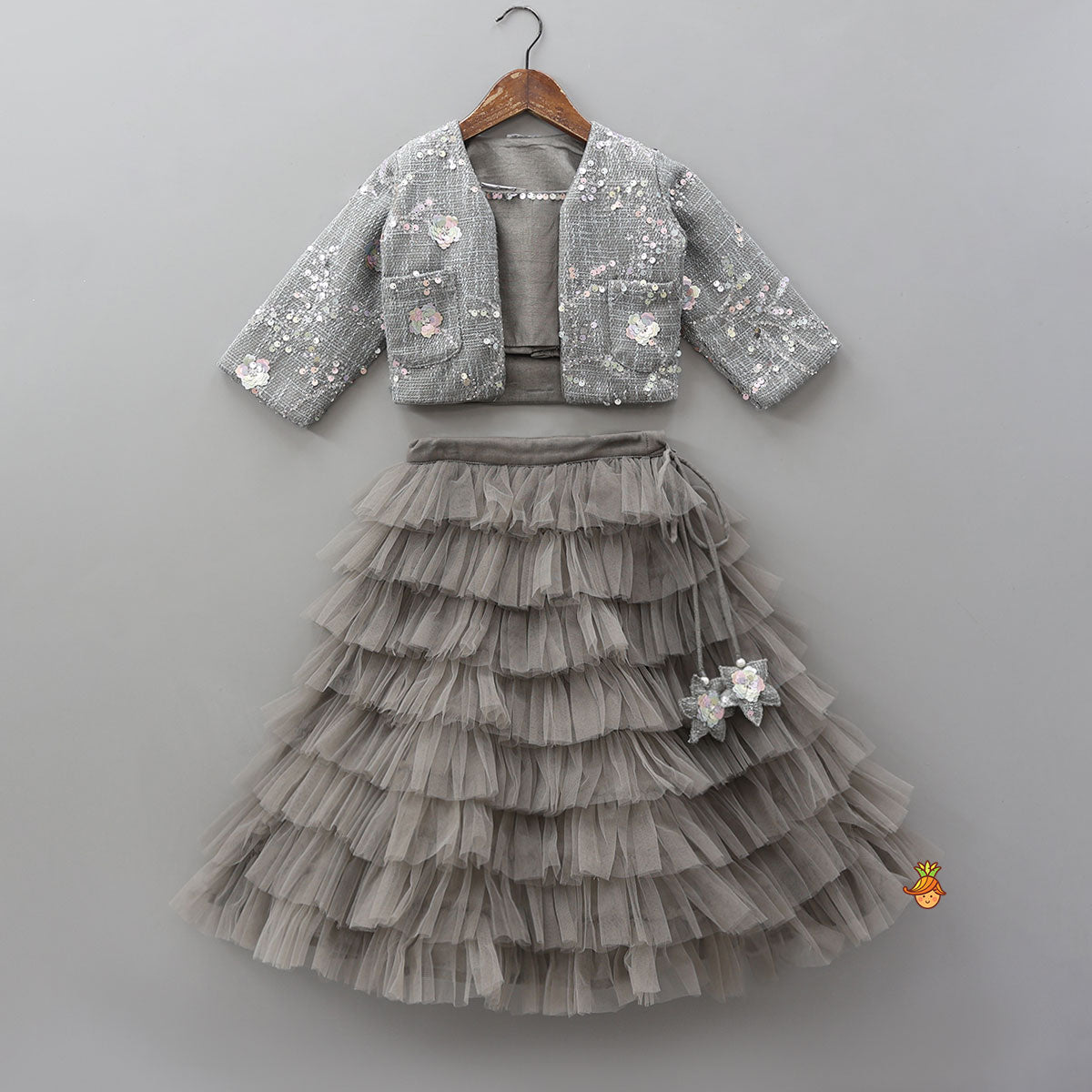 Beautiful Top With Open Jacket And Layered Net Lehenga