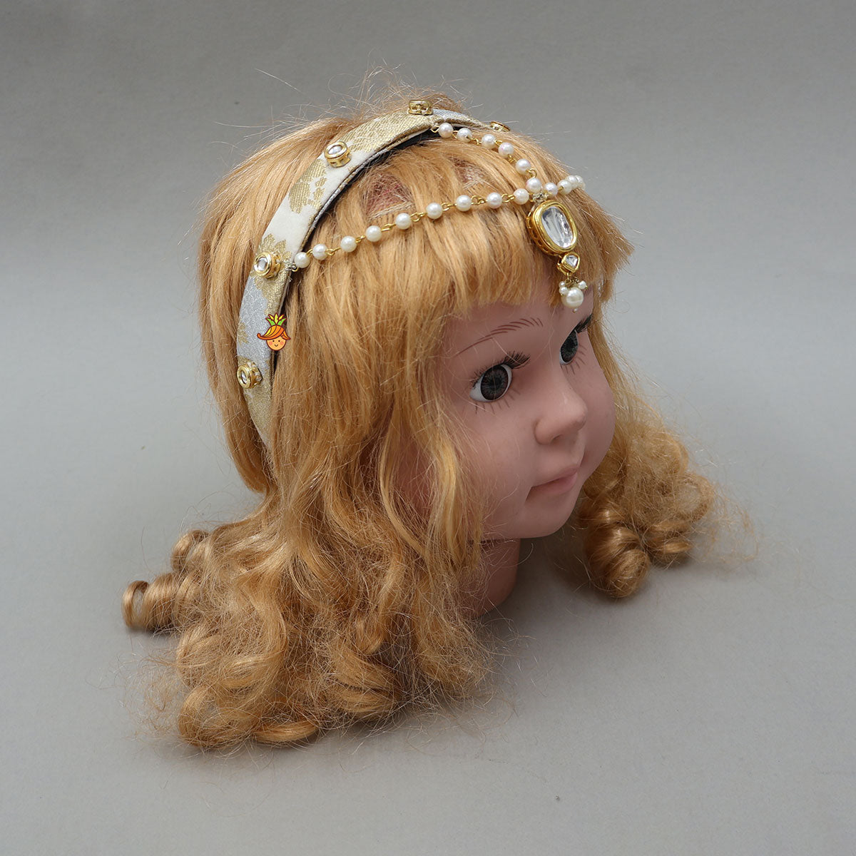 Exquisite Halter Neck Brocade Top With Embellished Jacket And Brocade Lehenga With Matching Hair Band