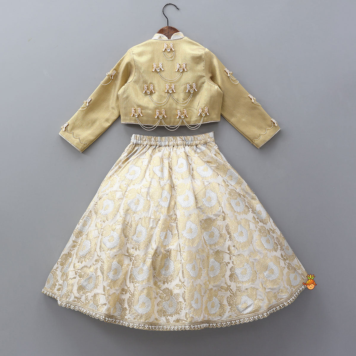 Exquisite Halter Neck Brocade Top With Embellished Jacket And Brocade Lehenga With Matching Hair Band