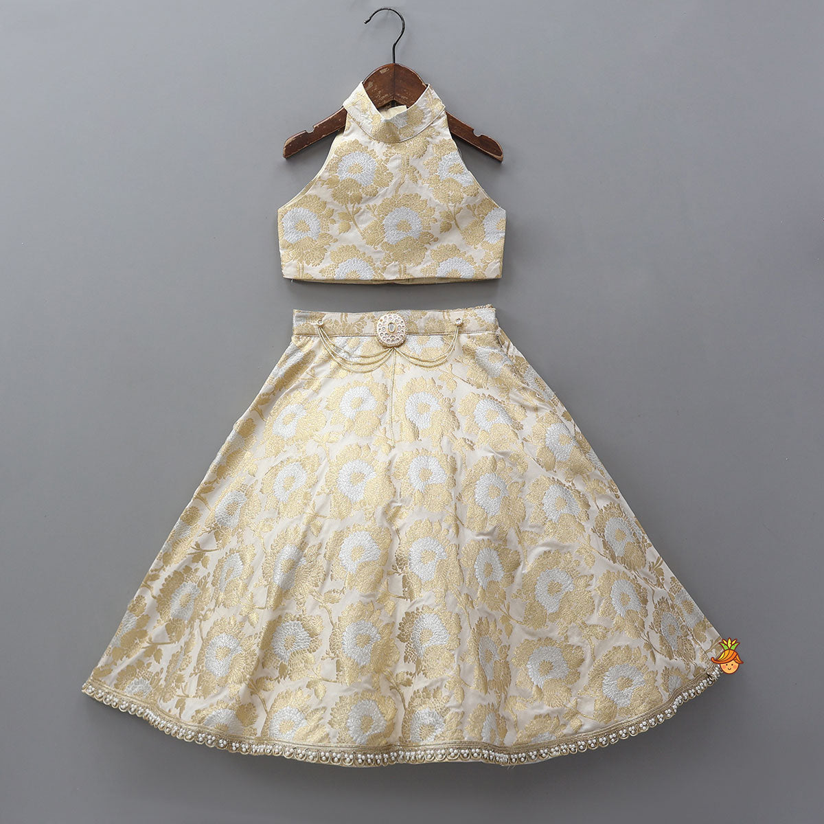 Exquisite Halter Neck Brocade Top With Embellished Jacket And Brocade Lehenga With Matching Hair Band