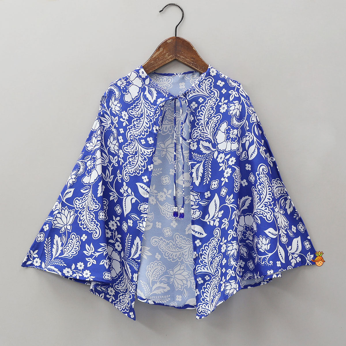 Strappy Crop Top And Dhoti Style Skirt With Printed Matching Cape