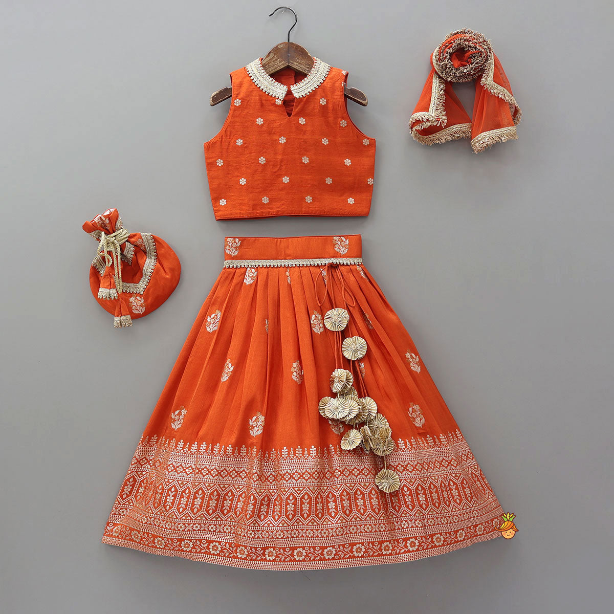 Beautiful Floral Motif Work Top And Lehenga With Matching Dupatta And Potli Bag