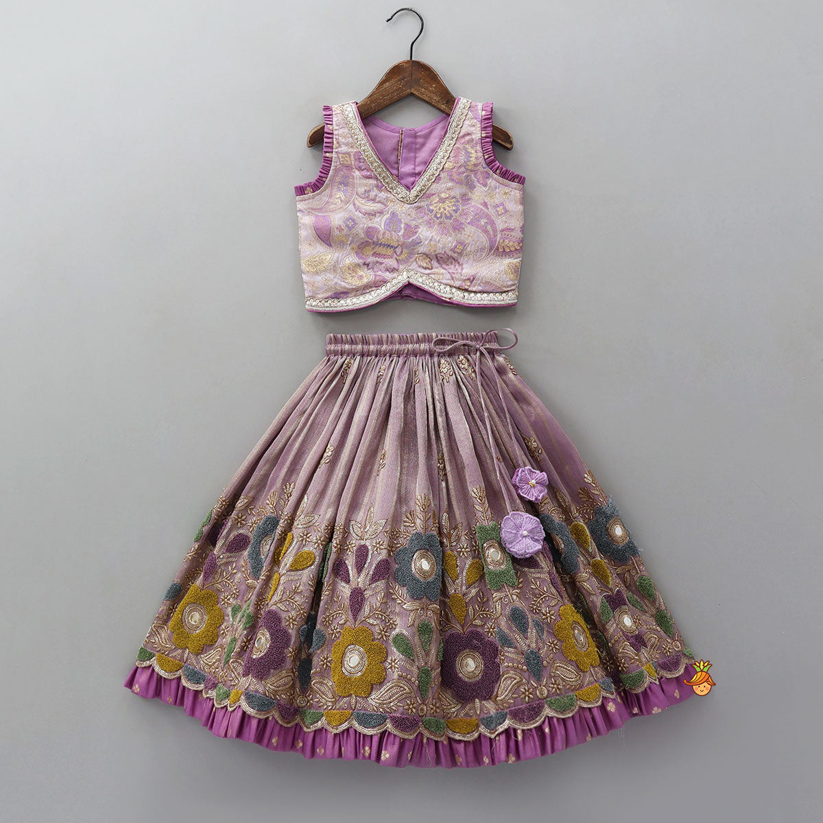 Pleated Armhole Top And Shimmery Lehenga With Matching Net Dupatta