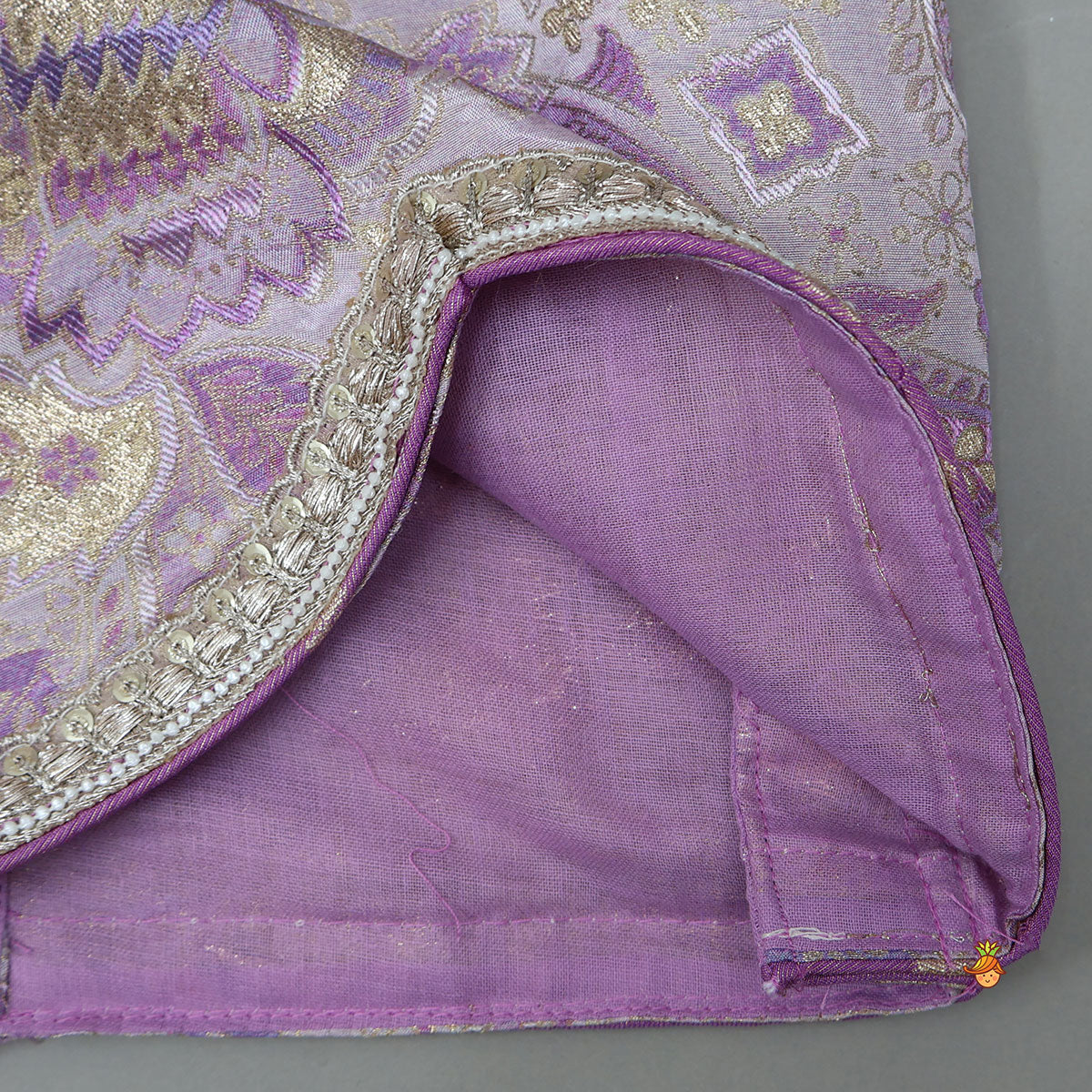 Pleated Armhole Top And Shimmery Lehenga With Matching Net Dupatta