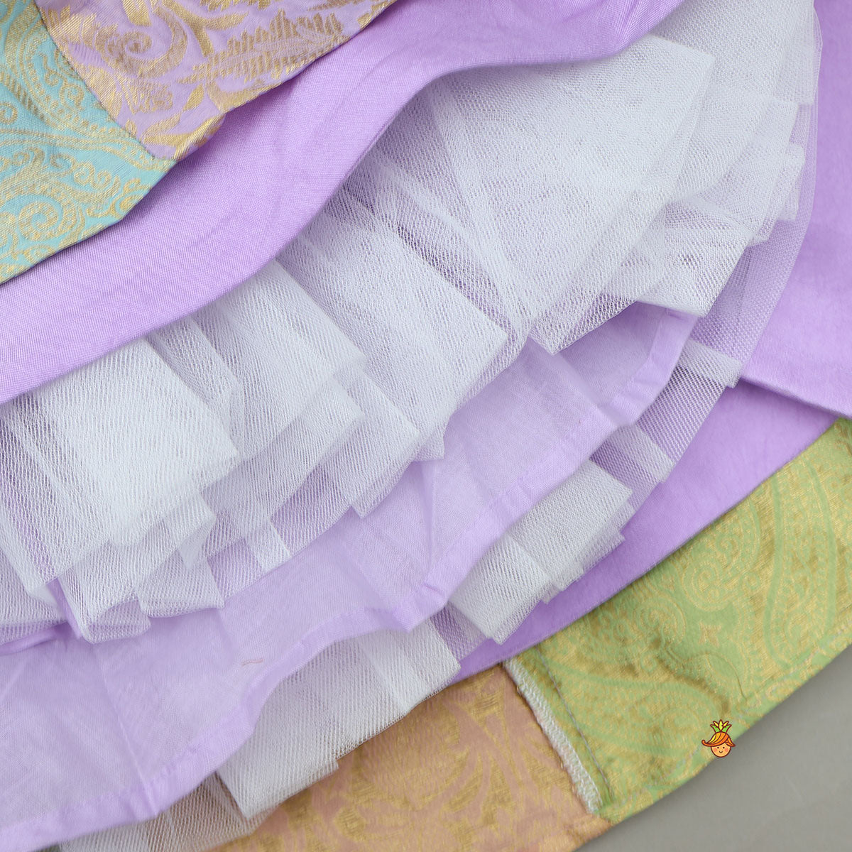 Intricate Embroidered Top And Brocade Lehenga With Matching Net Dupatta And Brocade Potli Bag