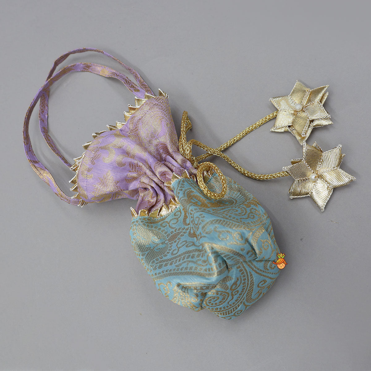 Intricate Embroidered Top And Brocade Lehenga With Matching Net Dupatta And Brocade Potli Bag