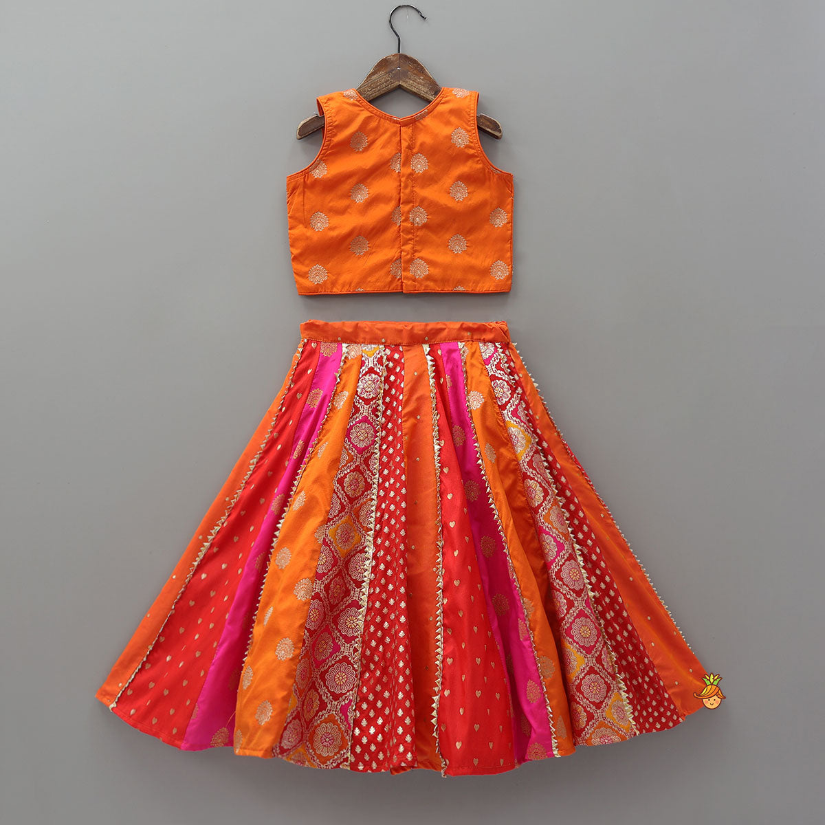 Embroidered Elegant Top And Brocade Lehenga With Matching Net Dupatta And Brocade Potli Bag