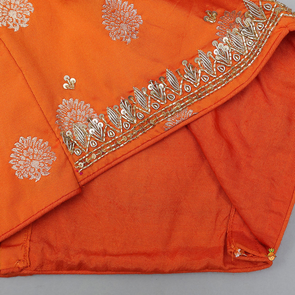 Embroidered Elegant Top And Brocade Lehenga With Matching Net Dupatta And Brocade Potli Bag