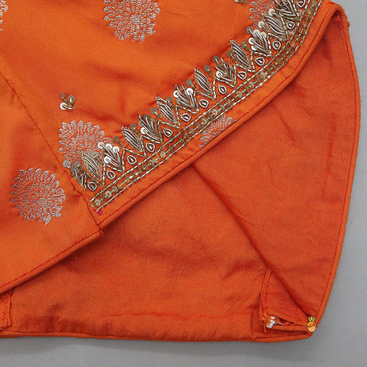 Embroidered Elegant Top And Brocade Lehenga With Matching Net Dupatta And Brocade Potli Bag