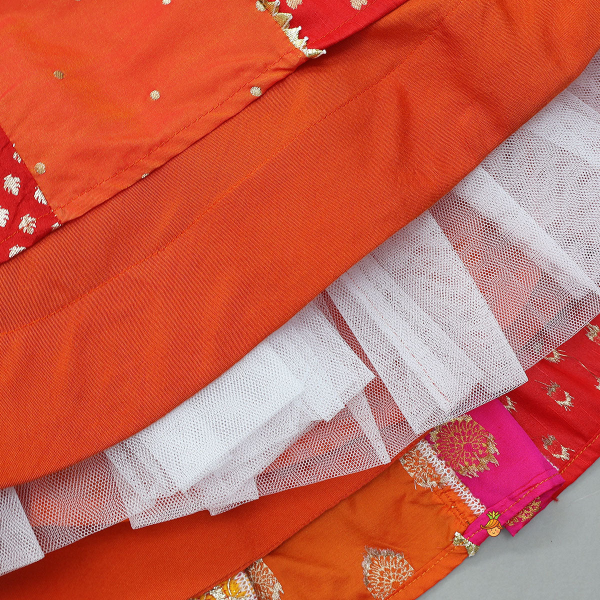 Embroidered Elegant Top And Brocade Lehenga With Matching Net Dupatta And Brocade Potli Bag