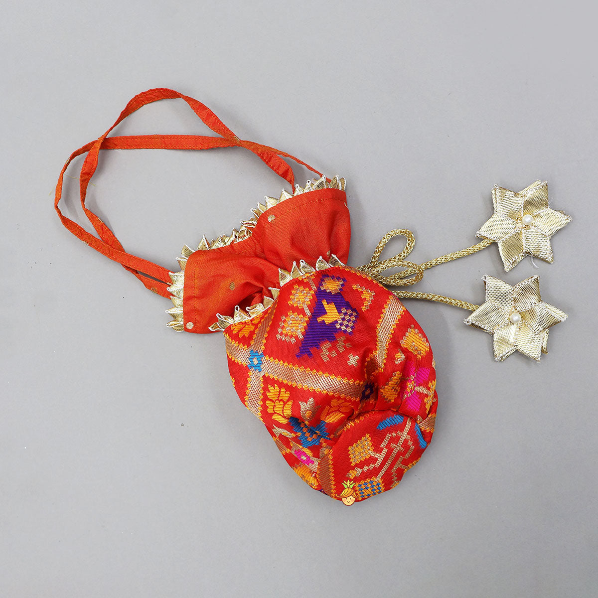 Embroidered Elegant Top And Brocade Lehenga With Matching Net Dupatta And Brocade Potli Bag