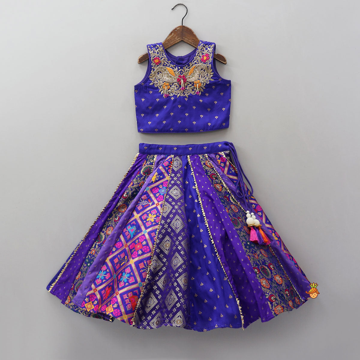 Gorgeous Embroidered Top And Brocade Lehenga With Matching Net Dupatta And Brocade Potli Bag