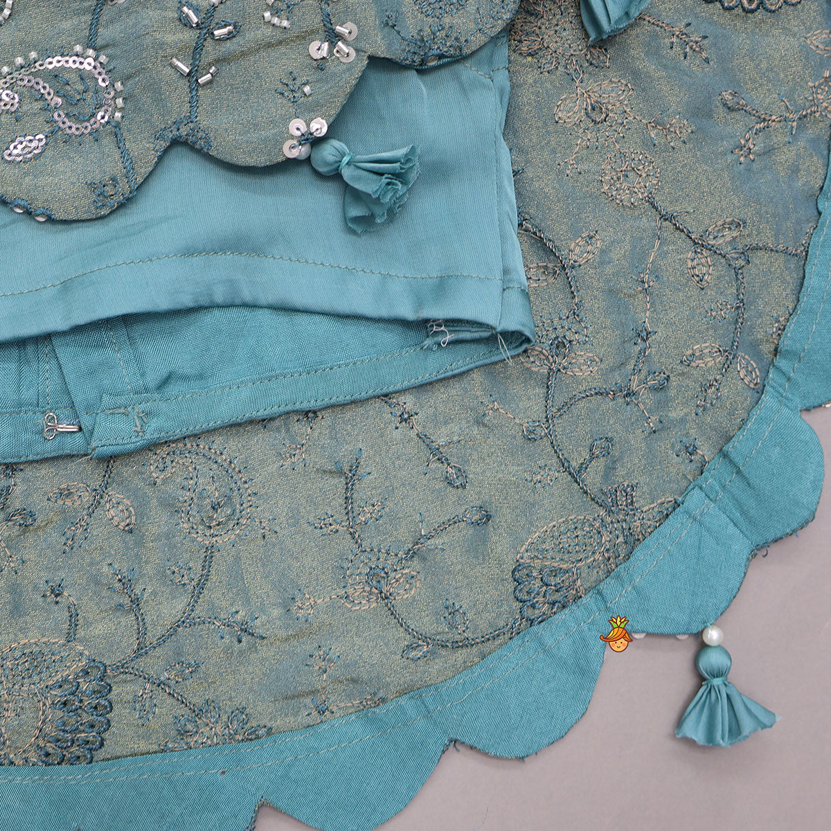Heavy Embroidered High-Low Shimmery Top And Lehenga