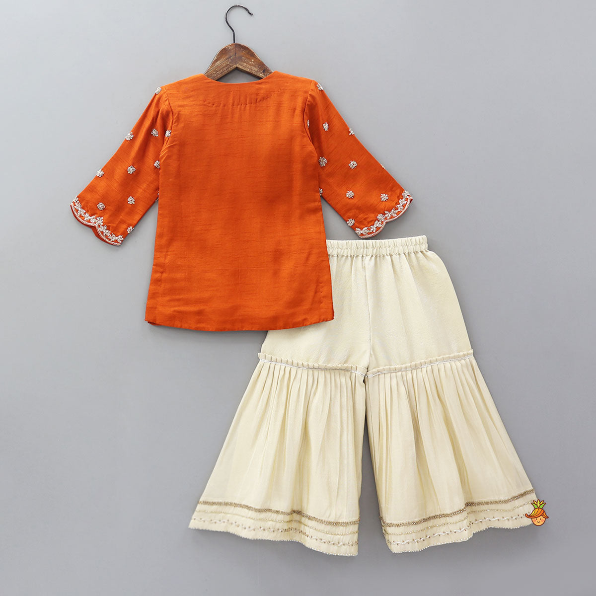 Scalloped Design Embroidered Kurti And Shimmery Sharara With Matching Dupatta