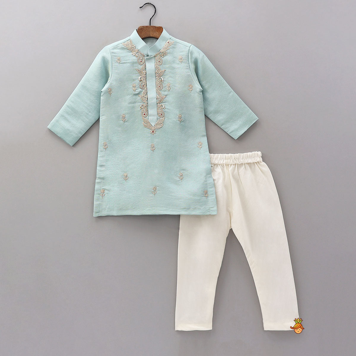 Beautifully Embroidered Shimmery Kurta And Churidar
