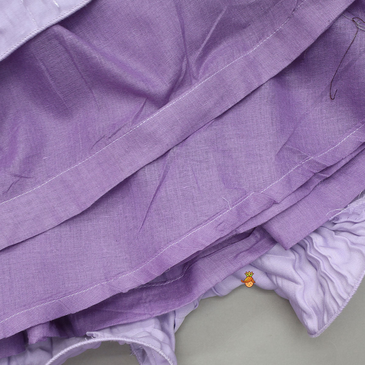 Stunning Criss-Cross Back Knot Top And Crushed Sheen Lehenga With Matching Hair Tie