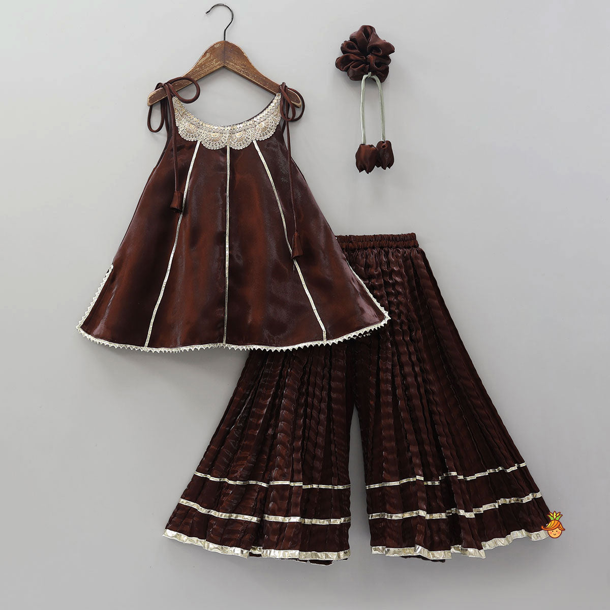 Sleeveless Sheen Kurti And Crushed Fabric Palazzo With Hair Tie