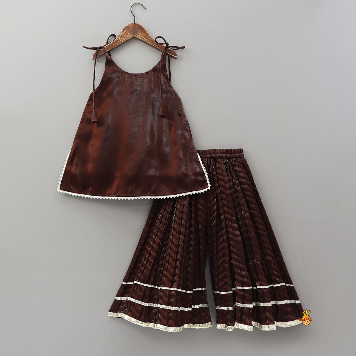 Sleeveless Sheen Kurti And Crushed Fabric Palazzo With Hair Tie