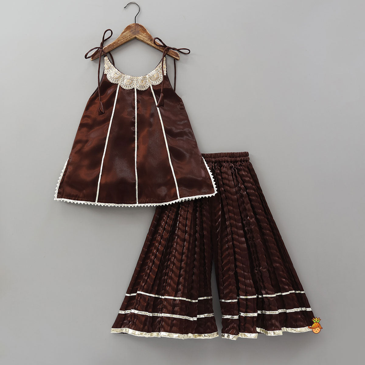 Sleeveless Sheen Kurti And Crushed Fabric Palazzo With Hair Tie