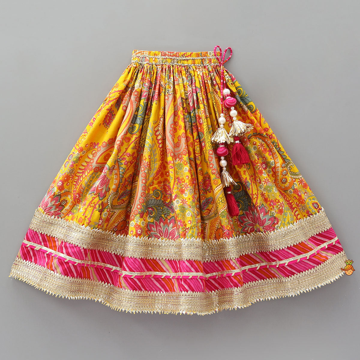 Vibrant Paisley Printed Lehenga and Leheriya Printed Top With Dupatta