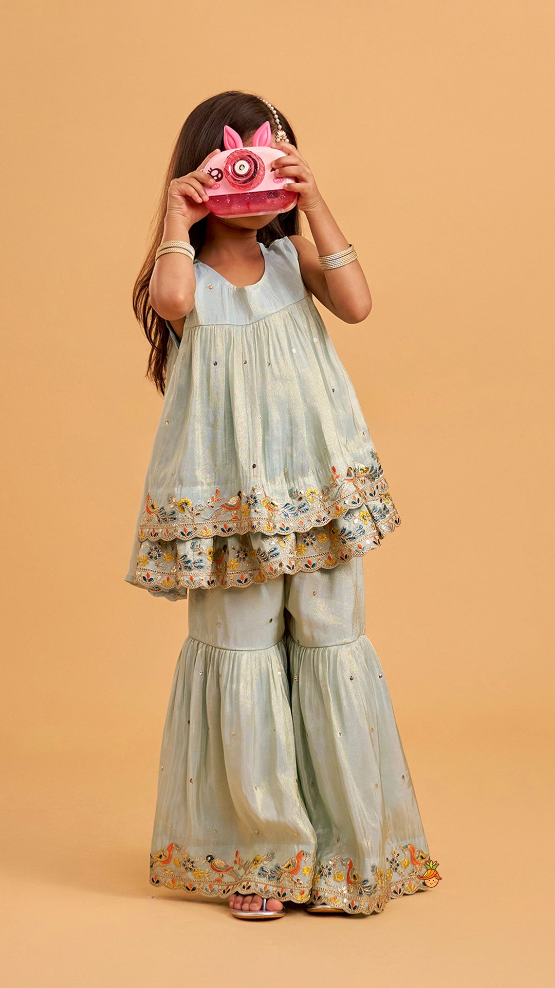 Layered Shimmery Kurti And Sharara With Contrasting Dupatta