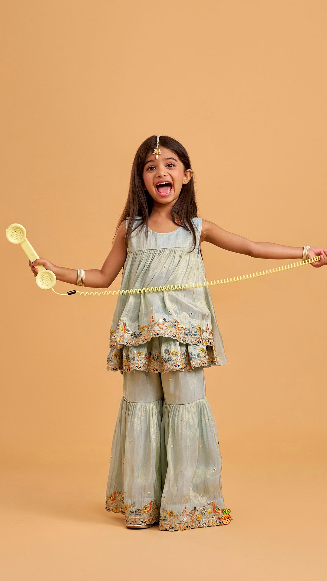 Layered Shimmery Kurti And Sharara With Contrasting Dupatta