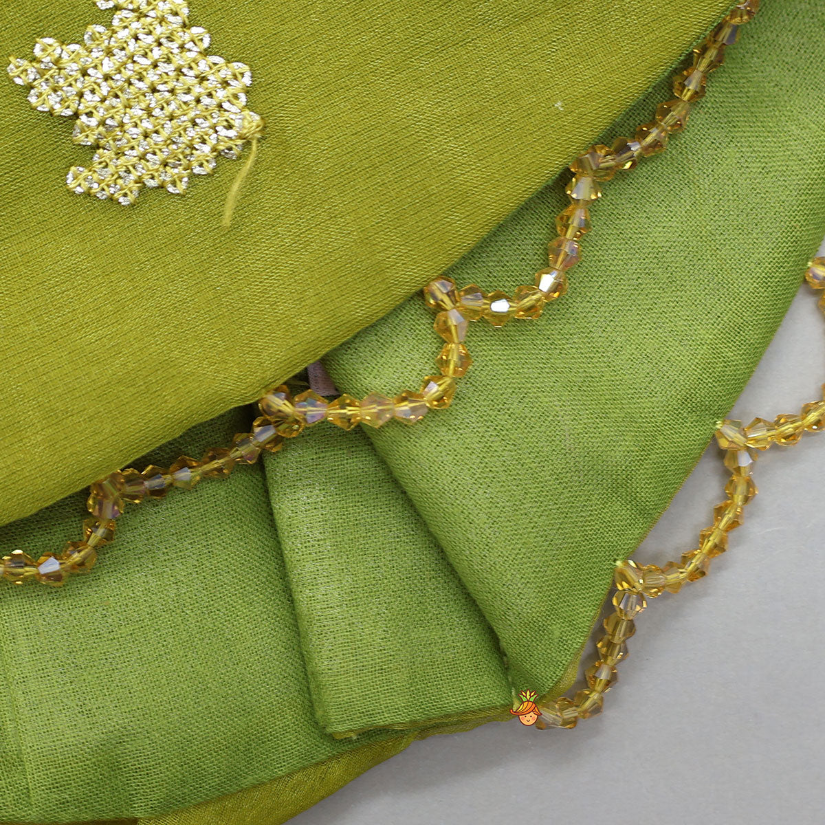 Organza Top And Lehenga With Handmade Tassel Detailing