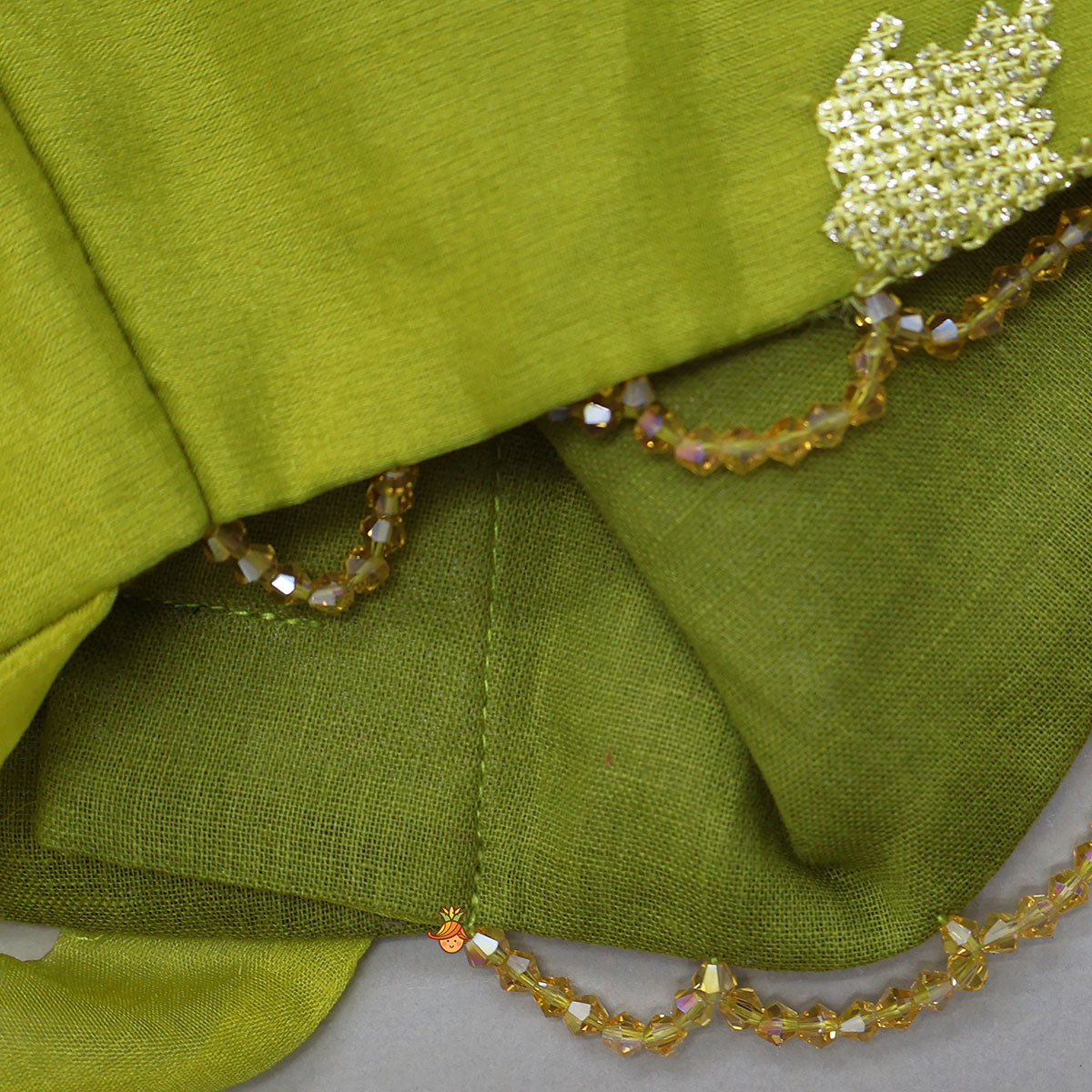 Organza Top And Lehenga With Handmade Tassel Detailing