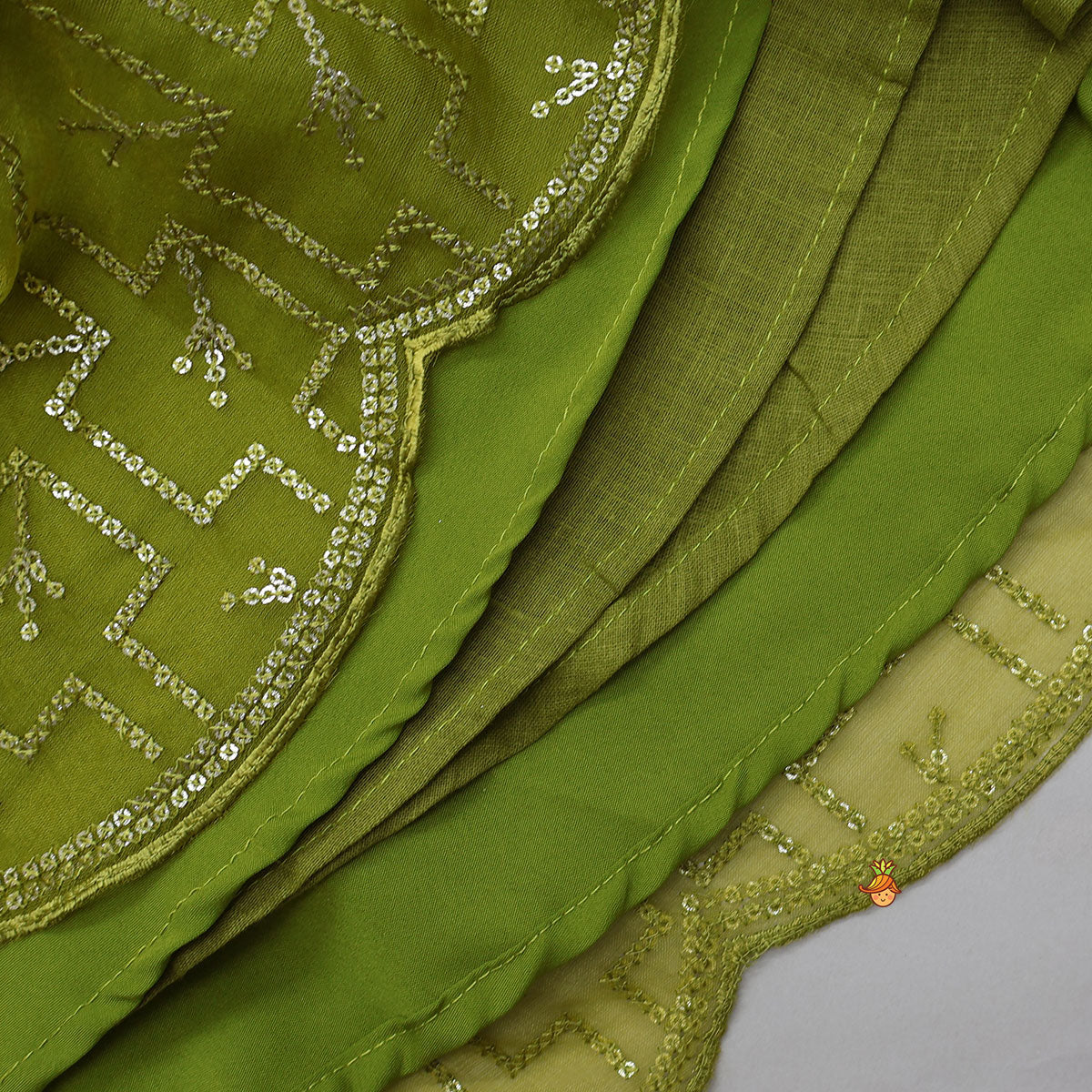Organza Top And Lehenga With Handmade Tassel Detailing