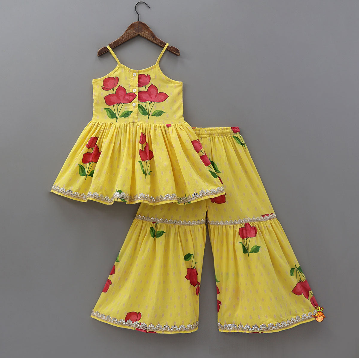 Vibrant Floral Strappy Peplum Top With Sharara And Dupatta